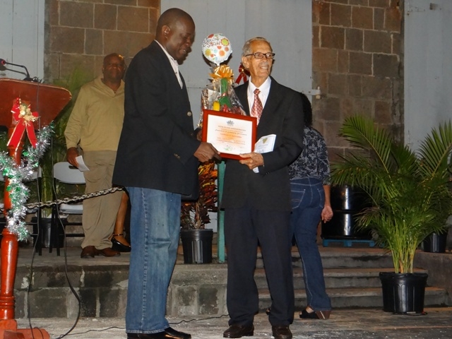 Area Representative for the St. Paul’s Parish Hon. Robelto Hector with Patron for the traditional annual Christmas Tree Lighting Ceremony in Charlestown Mr. Arthur Evelyn